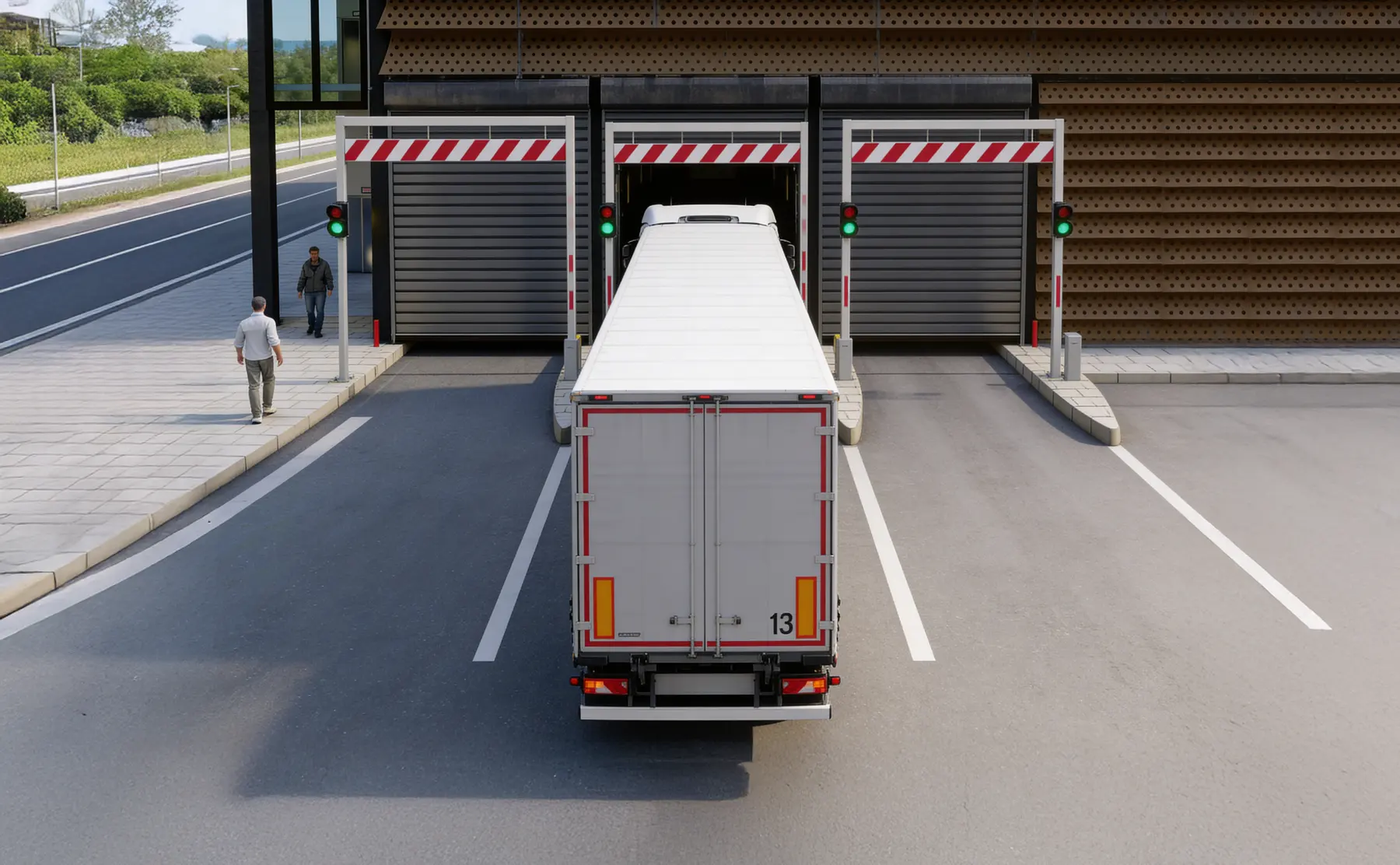 LKW fährt in die Übergabestation, Ampeln auf Grün